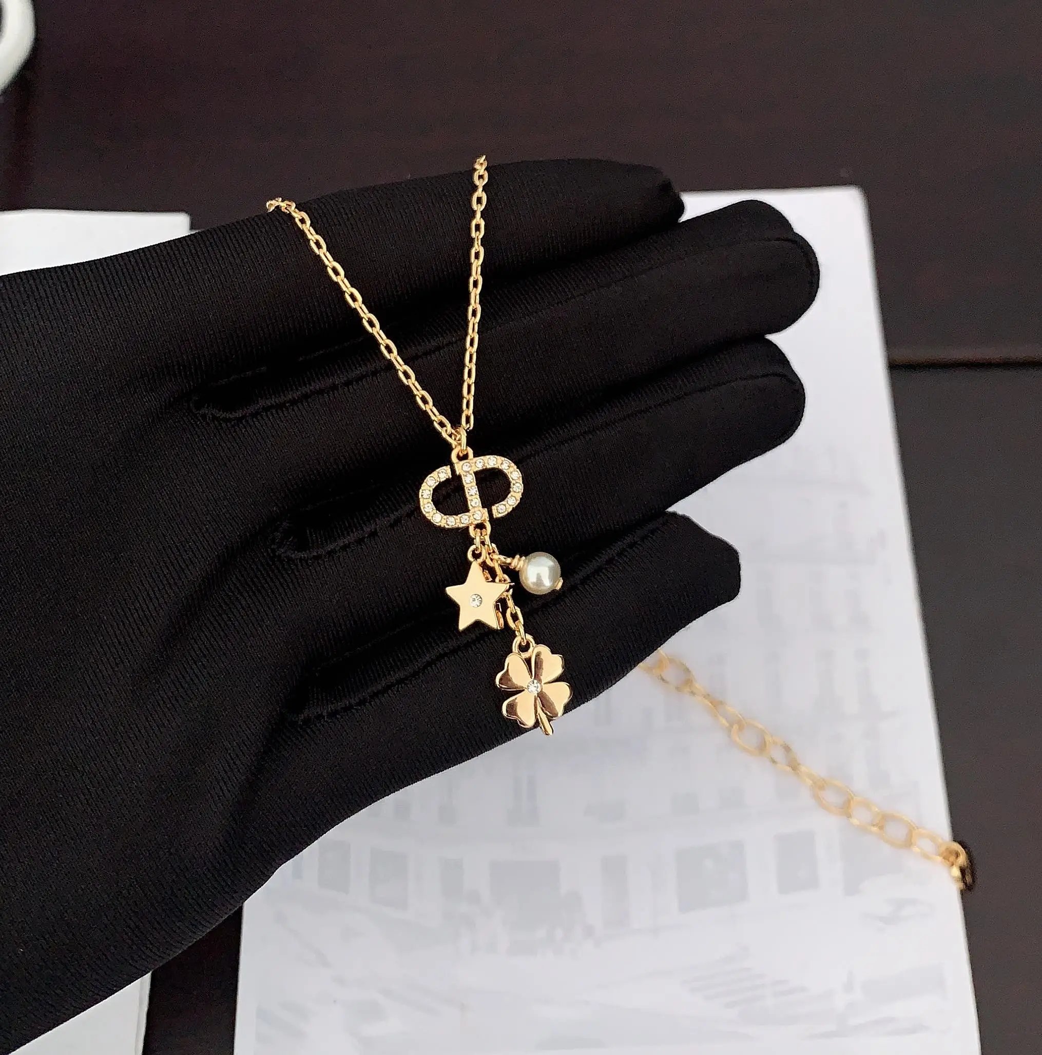 Di*or's latest four-leaf clover necklace